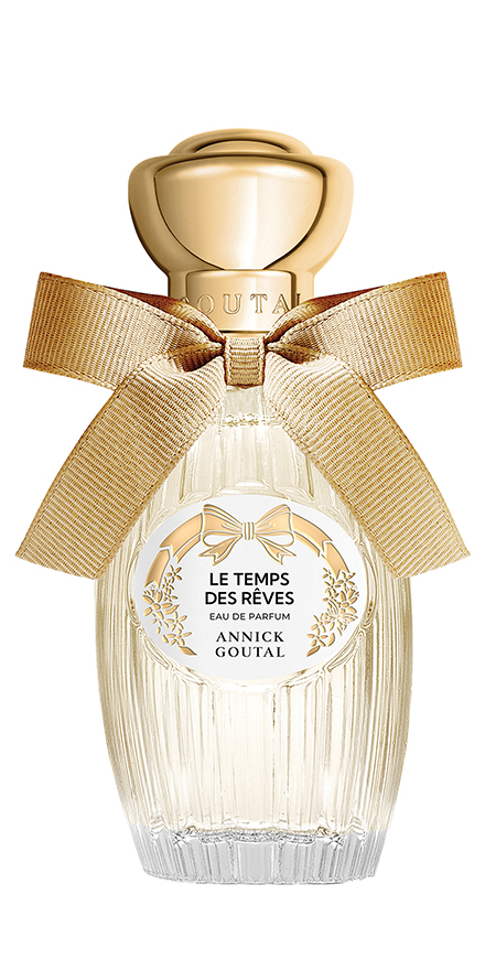 goutal-nobilis-group-packshots-880x440-LE-TEMPS-DES-RÊVES - BERGERAT | WE MAKE BEAUTY PERFORM Perfume bottle with a gold cap and wide beige ribbon bow, label reads Le Temps des Rêves, Annick Goutal, eau de parfum in a crystal-clear bottle.